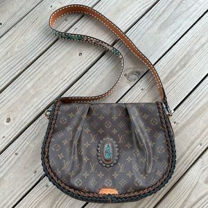 Louis Vuitton revamped Menilmontant GM
